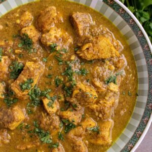 Chicken Vindalo met Nan brood.