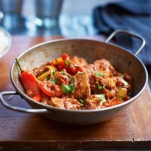 Lamb Tikka Jal-Ferizi met rijst.
