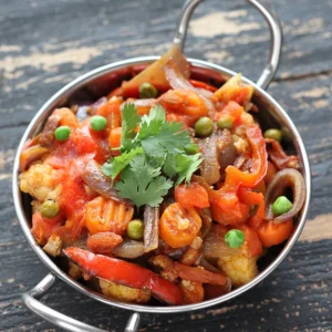 Vegetables Jal-Ferizi met Nan brood.