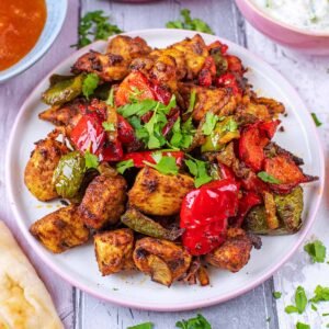 Lamb Tikka Chilly Frey met rijst.