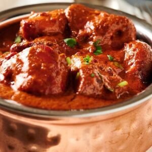 Chicken Tikka Massala met Nan brood.