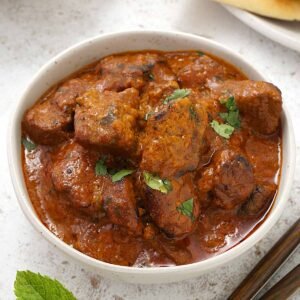Lamb Tikka Chilly Frey met Nan brood.